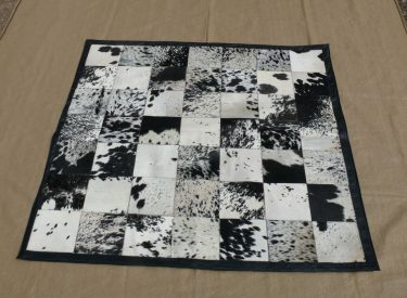  (a) Medium black and white Nguni quilt carpet (.60 x 1.60 (R3 500)