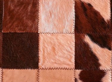 (b) Small tri-colour Nguni hide carpet close-up
