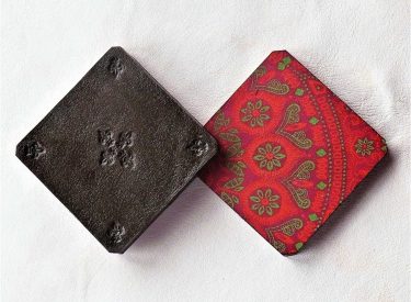 Embossed veg tan leather coasters with vibrant traditional Shweshwe backing (R60 each)