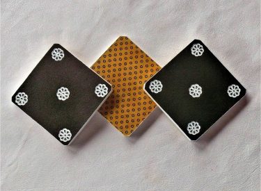 Embossed and hand painted veg tan leather coasters with traditional Shweshwe fabric backing (R70 each)