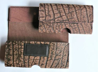 Cell phone pouch's have magnetic shutters.